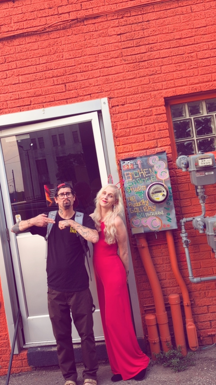 Seth Stolz and Latrisha Matson outside The Audacity Gallery in Buckham Alley